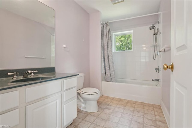 full bathroom with tile patterned floors, vanity, toilet, and shower / bath combo