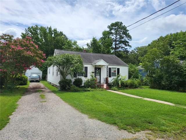 view of front of home with a front lawn