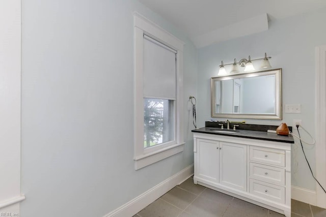 bathroom with vanity and tile patterned flooring