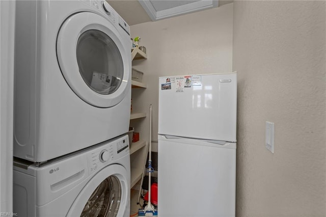 laundry room with stacked washer and dryer