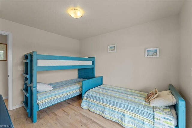 bedroom with light wood-type flooring