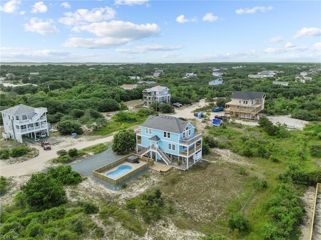 aerial view with a wooded view