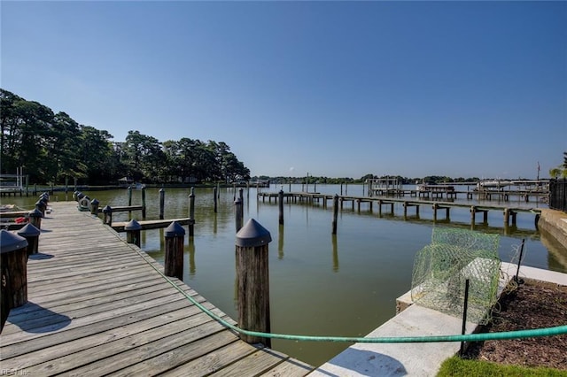 view of dock with a water view