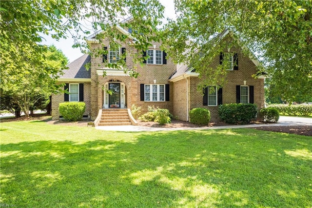 view of front of property with a front lawn