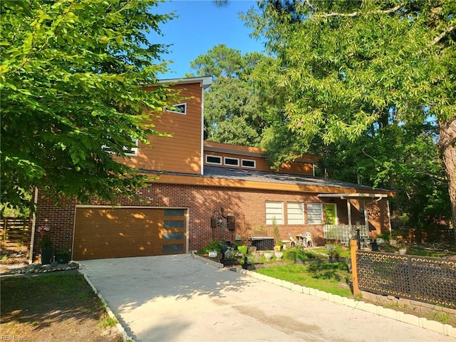 view of front of property with a garage