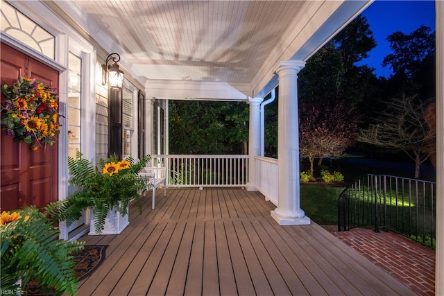 view of deck at twilight