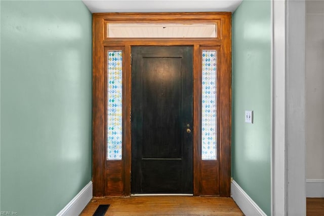 foyer entrance featuring light hardwood / wood-style flooring