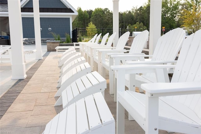 view of patio featuring fence