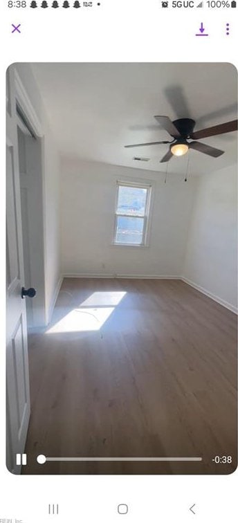 interior space with ceiling fan and hardwood / wood-style flooring