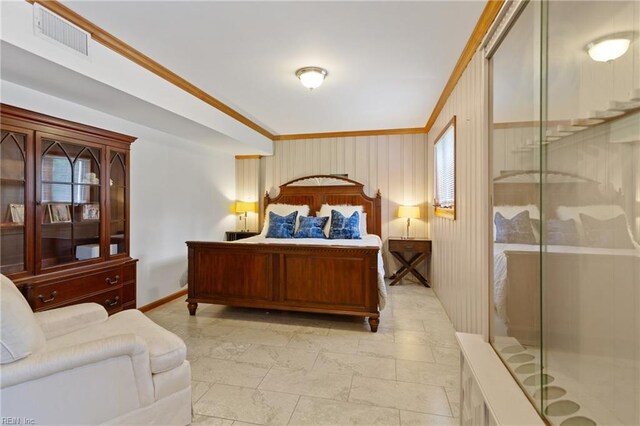 tiled bedroom with ornamental molding and multiple windows