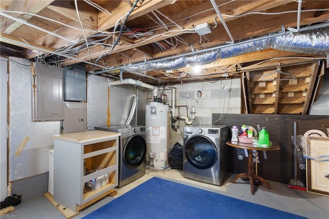 basement featuring gas water heater and washer and dryer