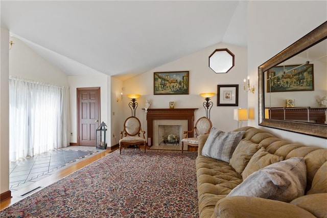 tiled living room with high vaulted ceiling