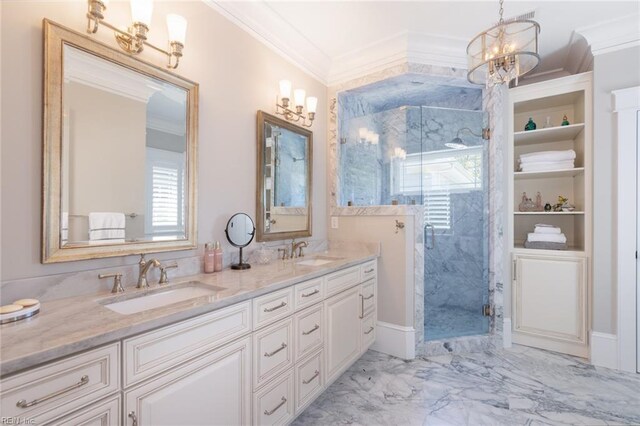 bathroom with marble finish floor, crown molding, a marble finish shower, and a sink