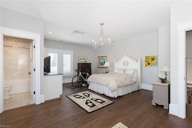 bedroom featuring dark wood-style flooring, ensuite bath, and baseboards