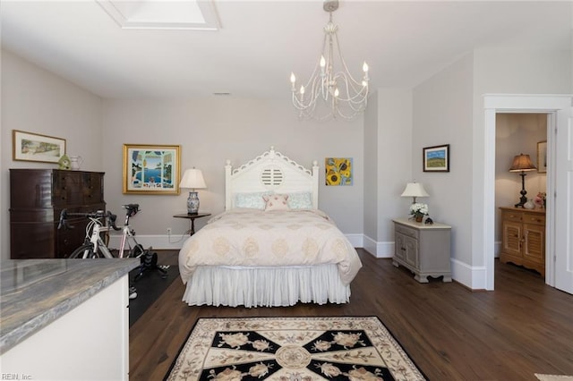 bedroom featuring an inviting chandelier, dark wood finished floors, and baseboards