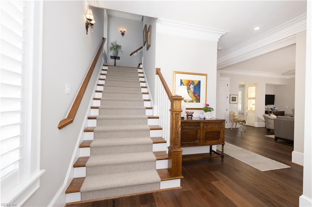 stairs featuring recessed lighting, crown molding, baseboards, and wood finished floors