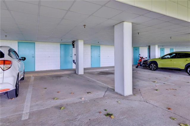 garage featuring a carport