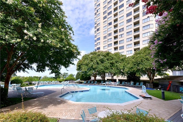 view of pool with a patio area