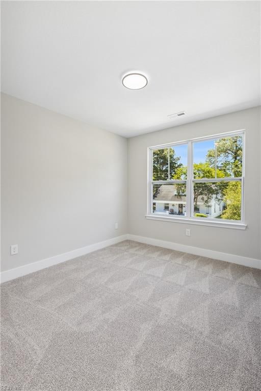 spare room with carpet flooring