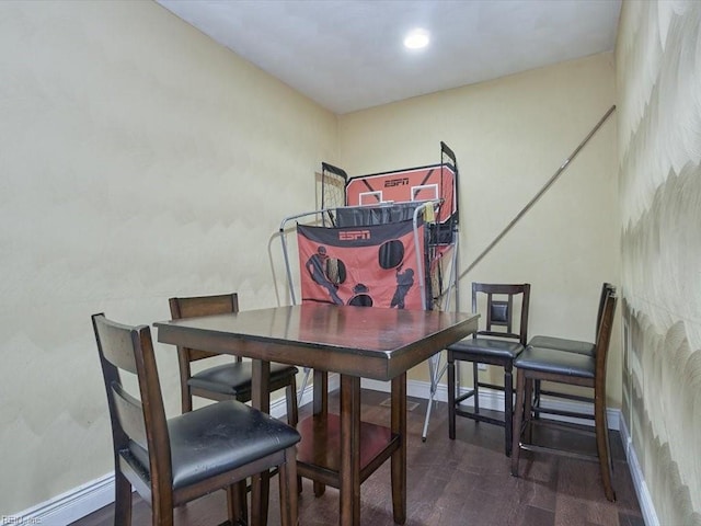 dining area featuring hardwood / wood-style floors