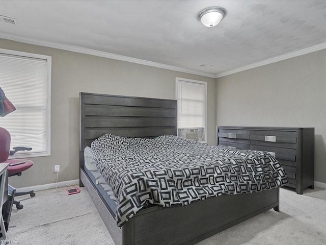 bedroom with crown molding, cooling unit, and light carpet