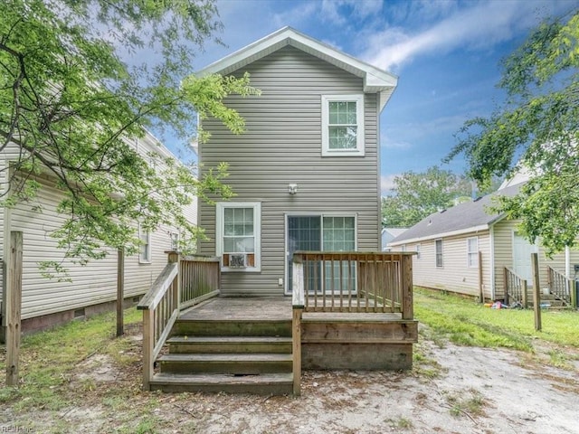 rear view of house with a deck