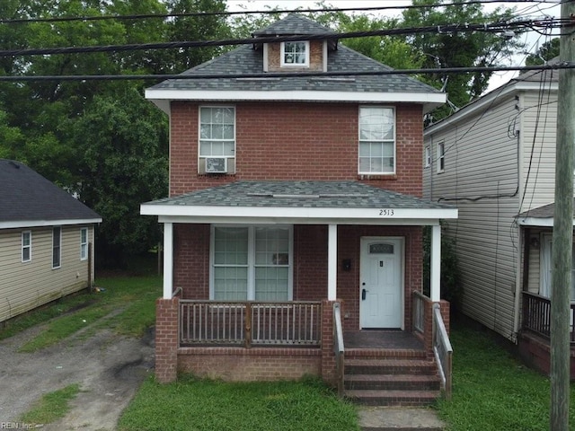 view of front of property featuring covered porch