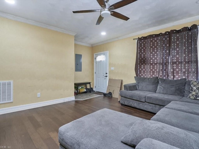 living room with ceiling fan, hardwood / wood-style floors, electric panel, and crown molding