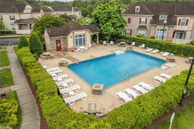 view of pool featuring a patio area