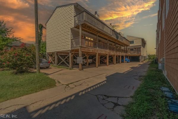 view of outdoor building at dusk