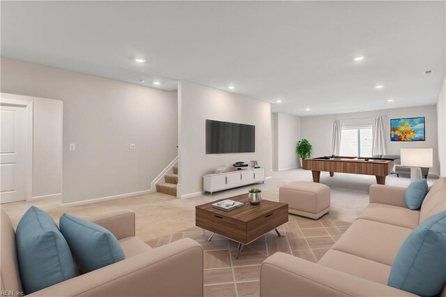 unfurnished living room featuring ornamental molding and light wood-type flooring