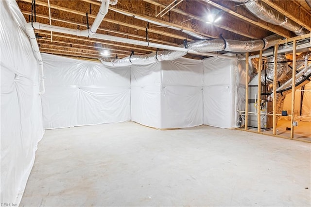 basement featuring gas water heater