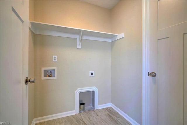 laundry area with electric dryer hookup, light wood-style floors, baseboards, hookup for a washing machine, and laundry area