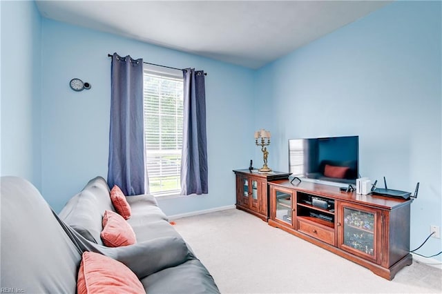 living room with a wealth of natural light and carpet