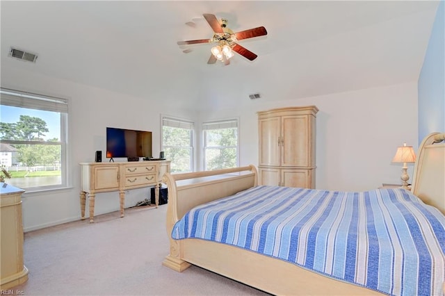 bedroom with ceiling fan and light colored carpet