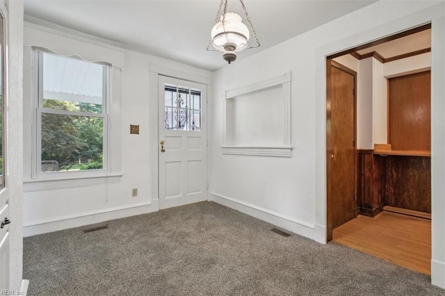 empty room featuring carpet flooring