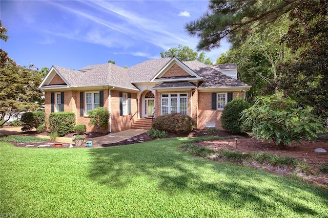 view of front of house with a front lawn