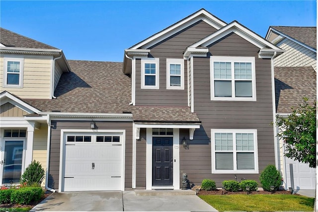 view of front of property with a garage