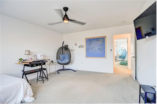 carpeted bedroom with a ceiling fan