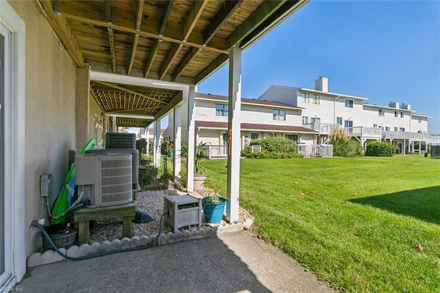 exterior space featuring central AC unit and a residential view