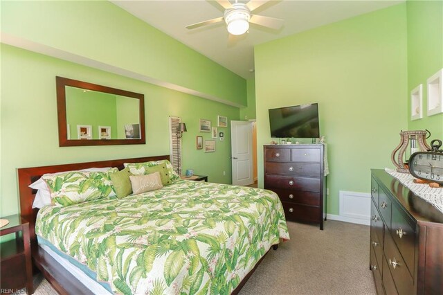 bedroom with light colored carpet and ceiling fan