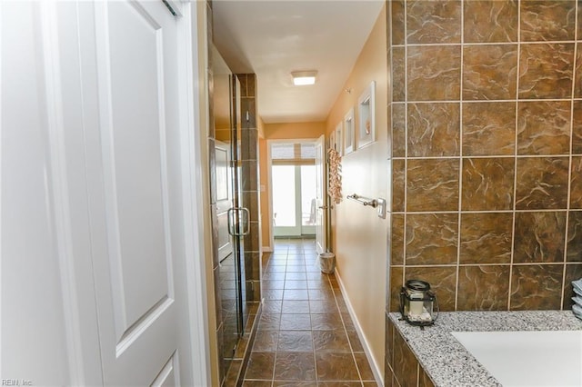 bathroom with tile patterned floors