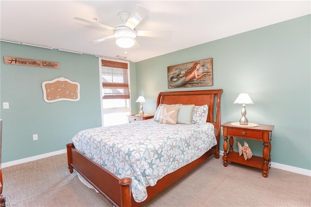 bedroom featuring ceiling fan and light carpet