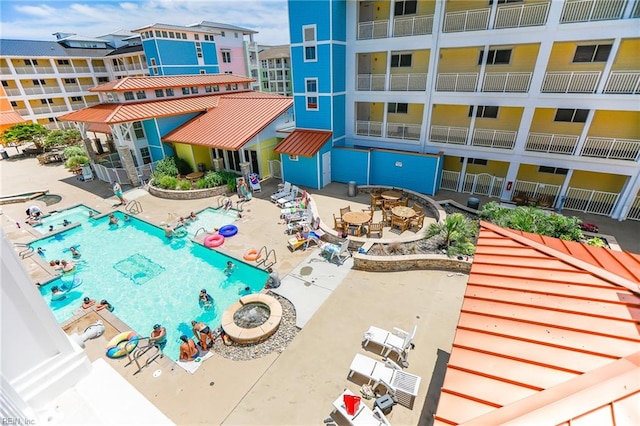 view of pool featuring a patio