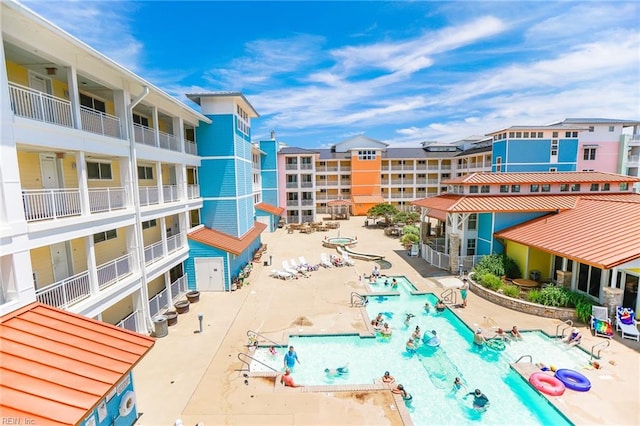 view of pool featuring a patio area