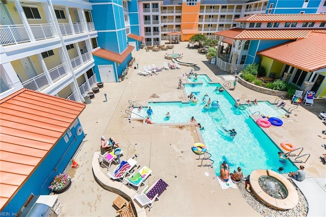 view of swimming pool featuring a patio area