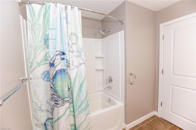 bathroom with tile patterned flooring and shower / bath combo with shower curtain