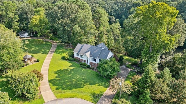 aerial view featuring a view of trees