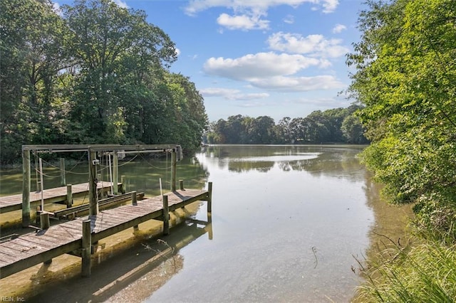 view of dock with a water view and boat lift