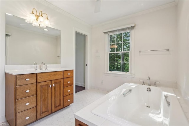 bathroom with a tub to relax in, ornamental molding, and vanity